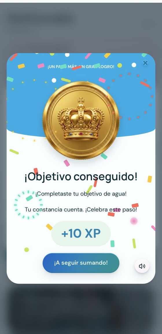App real de Break Free: celebración de objetivo conseguido con medalla y recompensa de XP
